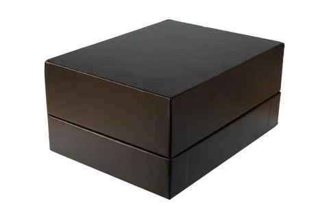 Minimalist matte black rectangular packaging box with premium design Stock Photos