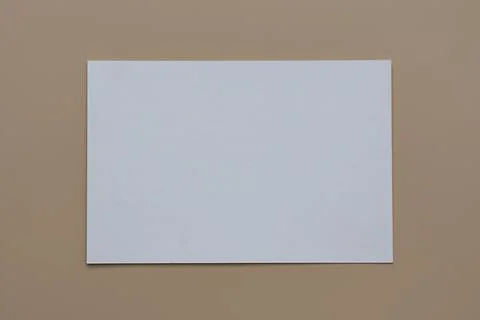 Minimalist mockup of a white rectangular greeting card and invitation. Templa Stock Photos