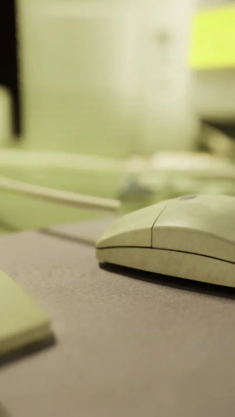 Minimalist office area featuring computer mouse and soft lighting Stock Footage 326162460
