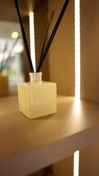 Minimalist Reed Diffuser Bottle on Shelf with Soft Light Stock Photos
