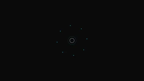 Minimalist ring of glowing light particles centered on a black background Vídeos de archivo 339619259