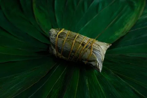 Minimalist solid color bamboo leaves and rice dumplings layout Stock Photos