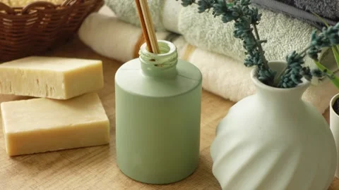 Minimalist Spa Arrangement With Reed Diffuser and Natural Soaps Stock Footage 293187972