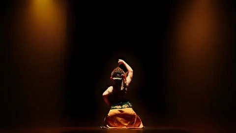 Minimalist Stage Composition with Traditional Dancer Under Warm Spotlight Stock Photos