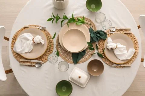 Minimalist table setting with natural elements and neutral tones Stock Photos