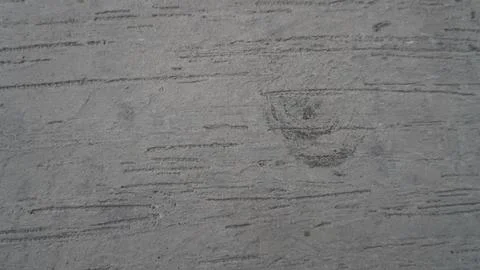 Minimalist Texture of a Plain Grey Concrete Wall With Brush Strokes Stock Photos