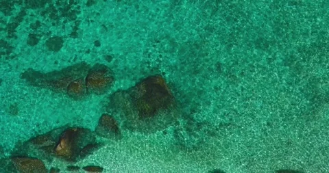 Minimalist Top Down Ocean Surface Texture Tropical Island Stock Footage 329773663