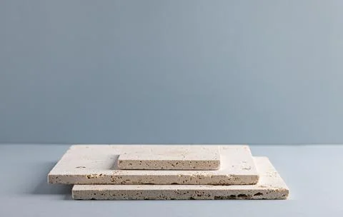 Minimalist Travertine Stone Tile Array on Grey Background for Modern Interi.. 库存照片