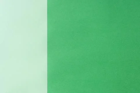 A minimalist two-tone paper background with a green. Stock Illustration