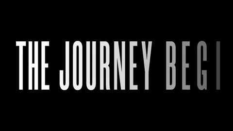Minimalist typography featuring the text the journey begins against dark bg Vídeos de archivo 342753079