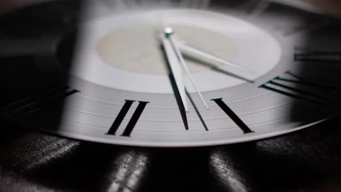 Minimalist Vinyl Record Clock in Real Time Close Up Video stock 328519684