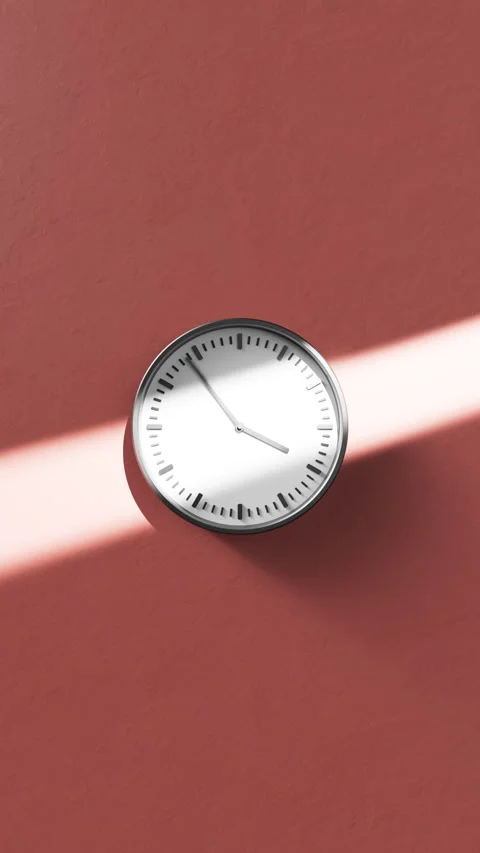 Minimalist Wall Clock with Shadow Cast from Sunlight Stock Footage 304622490