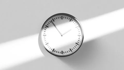 Minimalist Wall Clock with Shadow Cast from Sunlight Stock Footage 304622573