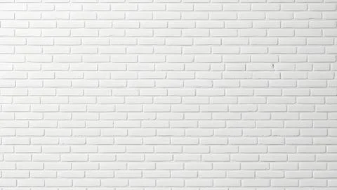 Minimalist white brick wall texture with a clean modern aesthetic and subtl.. Fotos de archivo