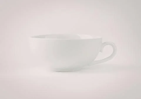 Minimalist white ceramic coffee cup with handle Photos