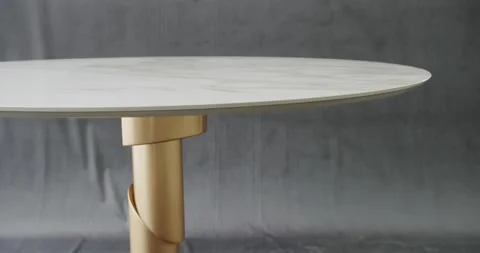 Minimalist White Dining Round Table on isolated gray background. Stock Footage 241023140