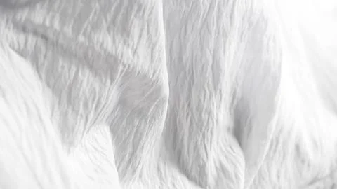 Minimalist white fabric texture with subtle soft lighting Stock Photos