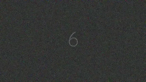 Minimalist white numeral 9 on dark grey backdrop for counting, math, and ab.. Stock Footage 342206816