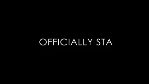 Minimalist white typography officially starting text on black background showing Video stock 342753045
