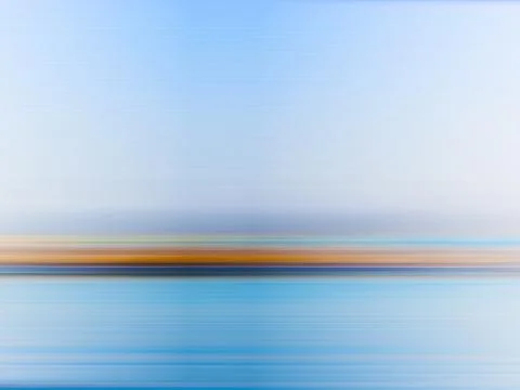 Minimalistic abstract blurred celestial blue background. Seascape, waterfront Stock Photos