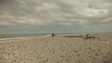 A minimalistic beach scene with sand full of stones Stock Footage 159981680