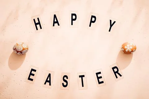 Minimalistic Easter composition. Retro style text. Top view. Flat lay Stock Photos