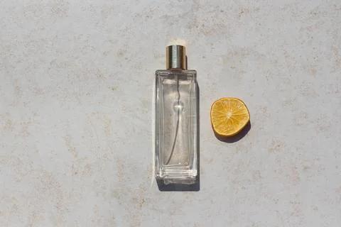 Minimalistic flat lay composition of a perfume bottle for mock up Stock Photos