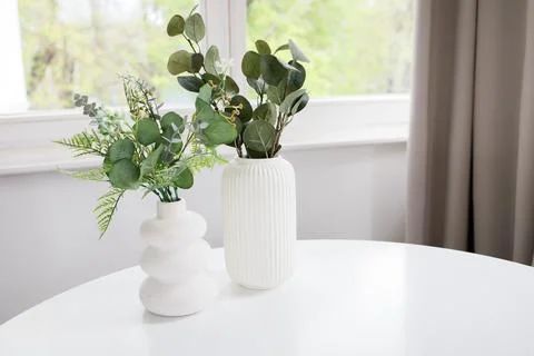 Minimalistic interior background with copy space: two vases with artificial.. Stock Photos
