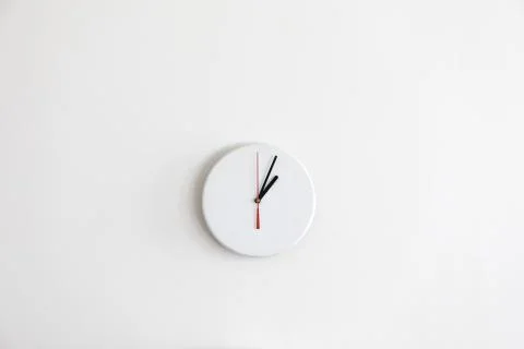 A Minimalistic Modern White Clock Without Numbers Stock Photos