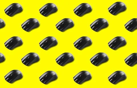 Minimalistic pattern with a wireless computer mouse Stock Photos