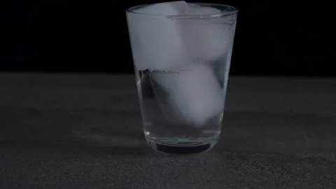Minimalistic rotating glass or cocktail Stock Footage 155689862