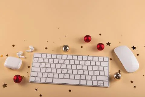 Minimalistic Stylish computer workplace among Christmas decorations Stock Photos