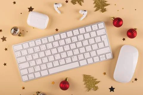 Minimalistic Stylish computer workplace among Christmas decorations Stock Photos