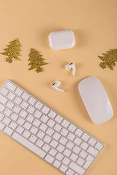 Minimalistic Stylish computer workplace among Christmas decorations Stock Photos