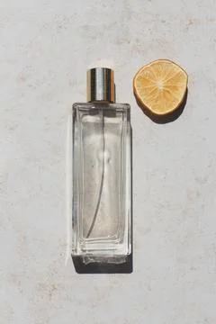 Minimalistic vertical flat lay composition of a perfume bottle Stock Photos