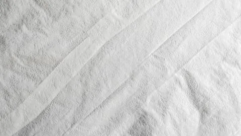 Minimalistic white crumpled fabric with pattern Stock Photos