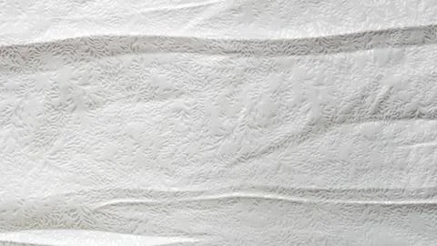 Minimalistic white crumpled fabric with pattern Stock Photos