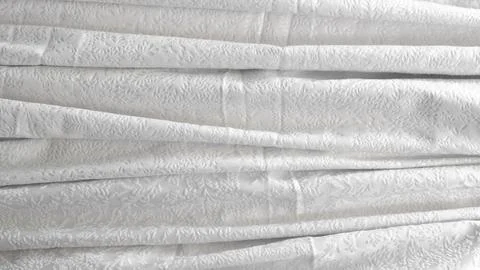 Minimalistic white crumpled fabric with pattern Stock Photos