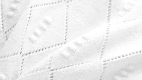 Minimalistic white fabric background pattern knitted 스톡 사진