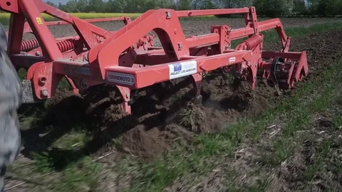Minimum tillage and harrowing the soil , travelling shot Stock Footage 113291136