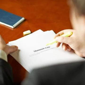 Minimum wage definition composition Stock Photos