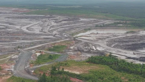 Mining activities on mining roads, dump trucks passing by carrying goods Stock Footage 332601683