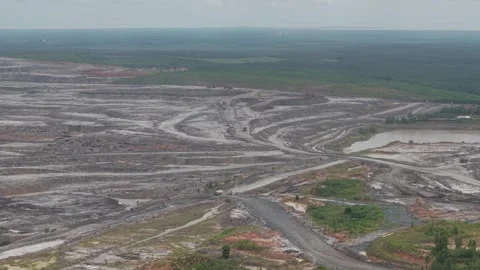 Mining activities on mining roads, dump trucks passing by carrying goods Stock Footage 332601721