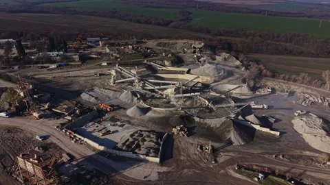 Mining activities at a quarry site in a rural area during daylight 库存影片 329996531