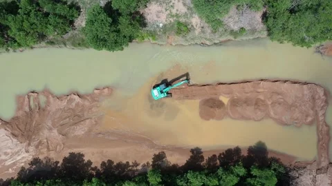 Mining beside river in rainforest. Stock Footage 131357875