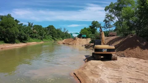 Mining beside river in rainforest. Stock Footage 131408424