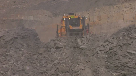 Mining - Bulldozer and Trucks Stock Footage 35524148