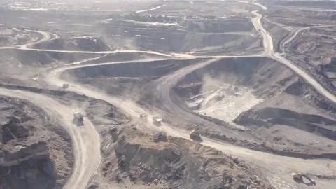 Mining coal at a coal mine without height on passing large trucks excavators Stock Footage 161547403