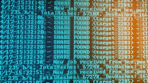 Mining Cryptocurrency process program on display PC. Using Software. Share Found Foto stock