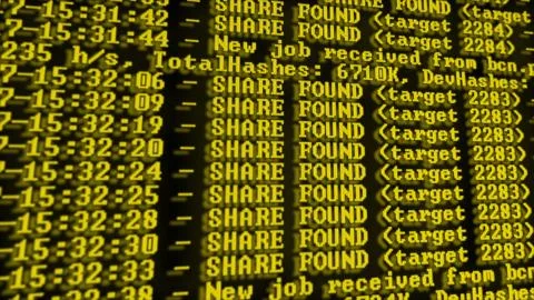 Mining Cryptocurrency process program on display PC. Using Software. Share Fo Stockfoto's